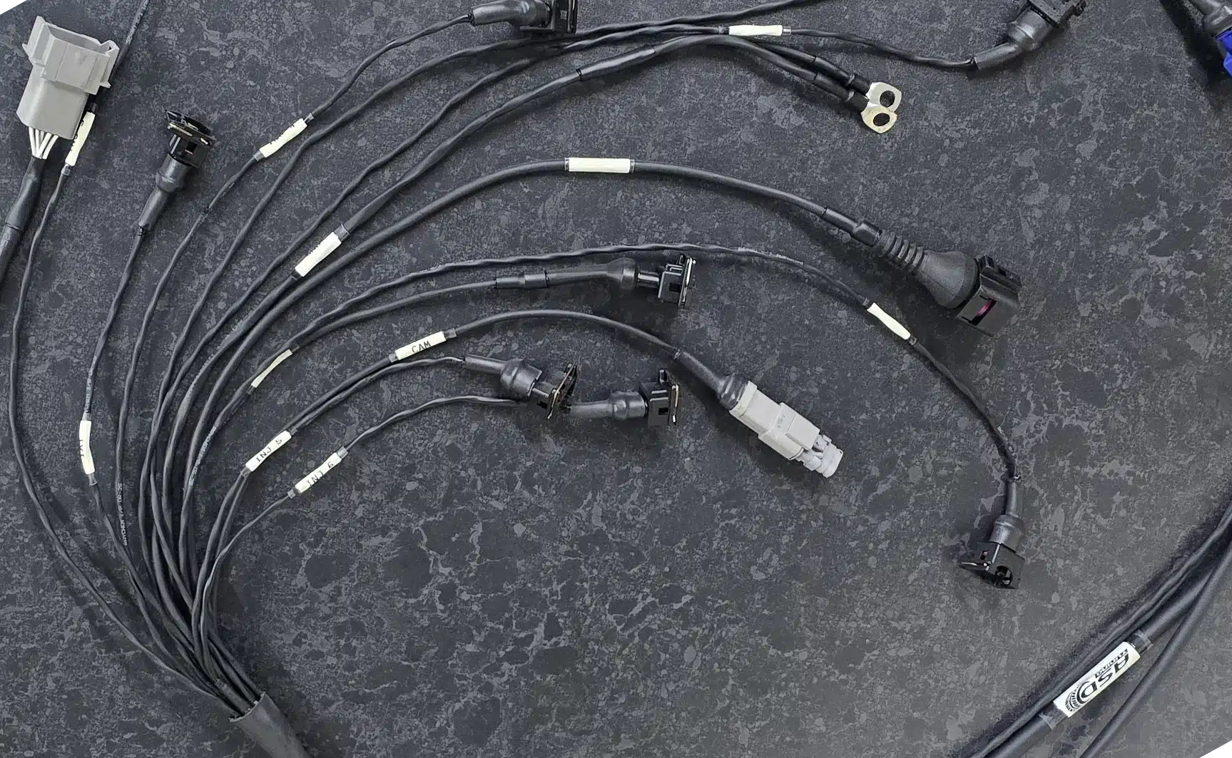 Bespoke motorsport wiring harness built by ASD Tuning